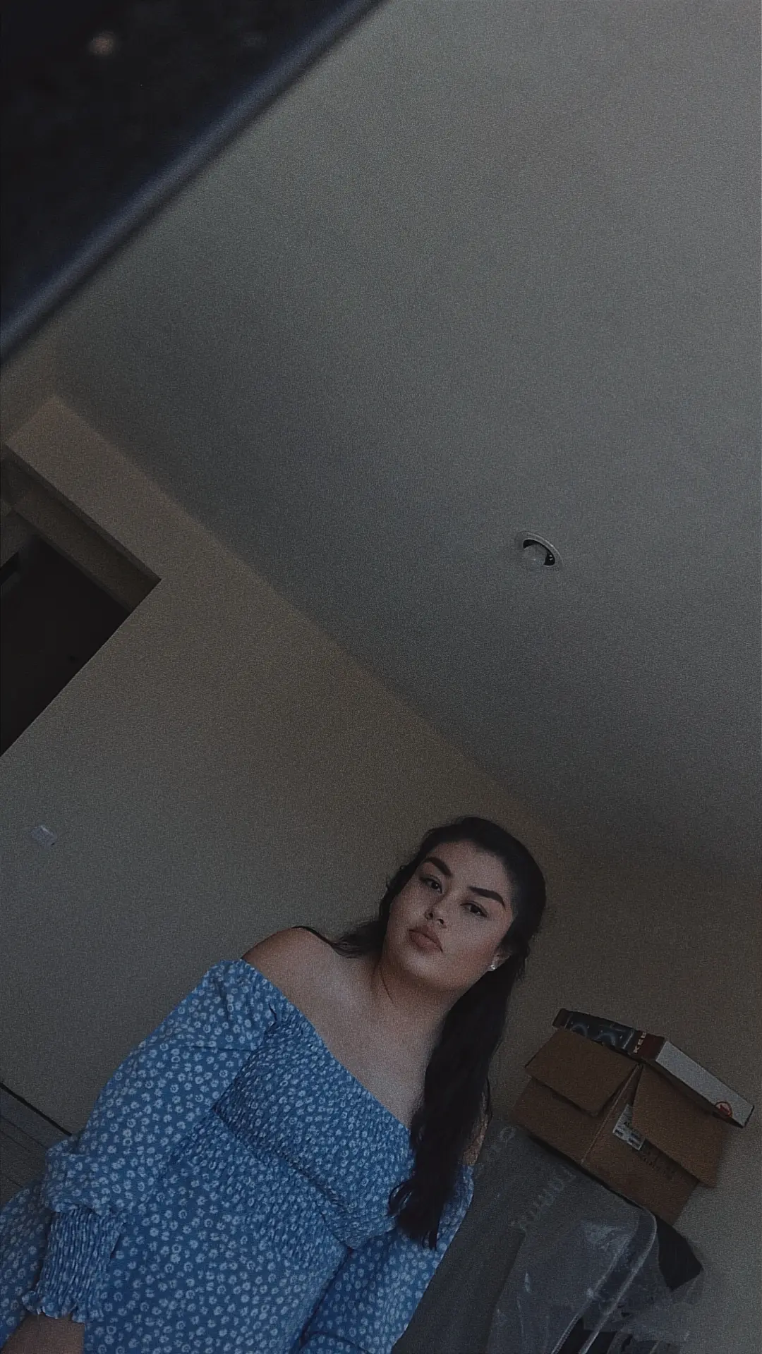 An intimate, candid close-up portrait, nostalgic and sincere mood. Using the reference image as a STRICT AND NON-NEGOTIABLE source, preserve the EXACT likeness, facial structure, and body proportions of the person.
**CRUCIAL FOR HAIR COMPOSITION: The person's hair is styled to fall loosely and naturally across their face, with strands partially obscuring one eye and creating a layered frame. Do not copy the exact hair length from the reference; prioritize this described interaction between the hair and face.**
The frame is an extreme close-up. Only one of their eyes is visible, peeking through the strands. Their hand, adorned with simple silver rings, gently brushes aside or gathers sections of their hair.
A soft ray of sunlight illuminates their visible eye and a subtle, warm smile. The lighting creates warm, golden highlights on the hair strands and skin.
candid photography, extreme close-up, hair over face, layered hair, natural movement, film grain, nostalgic, intimate portrait, hyperrealistic --