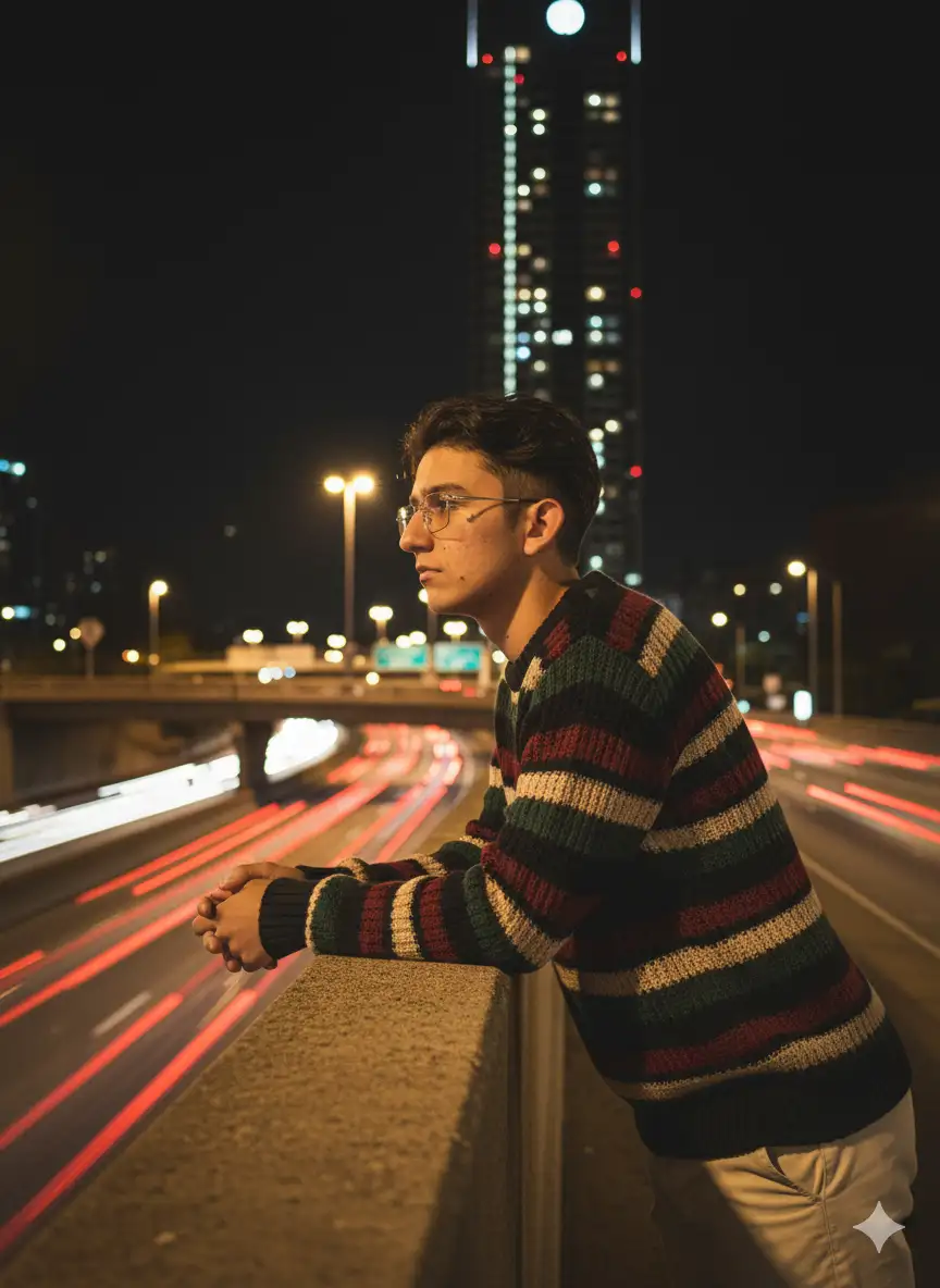 Using this image as reference: generate a high-end editorial portrait of the same person, preserving facial structure, skin tone, hair texture, and emotional expression with maximum fidelity. Do not remove natural imperfections. Asymmetries must be preserved.
The subject leans on the concrete railing of an urban overpass at night, dressed in a striped sweater with horizontal bands of red, black, beige, and green, paired with light-colored pants. The pose is contemplative, with the gaze directed into the distance, evoking solitude and introspection. The background features a cityscape with a tall building illuminated by scattered window lights and external glows. Below, a busy road pulses with blurred headlights and taillights, creating streaks of motion and warmth.
The composition is medium shot, slightly low angle, with the subject positioned off-center. The lighting must simulate real-world street illumination—warm yellow-orange tones from streetlights and passing cars, casting soft shadows and golden highlights across the face, clothing, and railing. Hair must retain its natural texture and subtle glow from ambient light.
The overall mood is urban, moody, and emotionally layered—suggesting a quiet moment of reflection amid the chaos of the city. The image should feel like a cinematic still from a coming-of-age film or a fashion editorial rooted in real life.
Camera settings:

- Lens: 50mm f/1.4
- ISO: 400
- Aperture: f/1.4
- Shutter speed: 1/125s
- Format: vertical (1080x1920)
- Lighting: warm ambient streetlight simulation (~3200K), with realistic shadows and glow
- Color grading: golden tones with deep blacks and soft city highlights
- Mood: introspective, cinematic, grounded
- Atmosphere: urban, emotionally quiet, visually rich
--v 5 --ar 3:4 --style raw --quality 2 --ref_photo